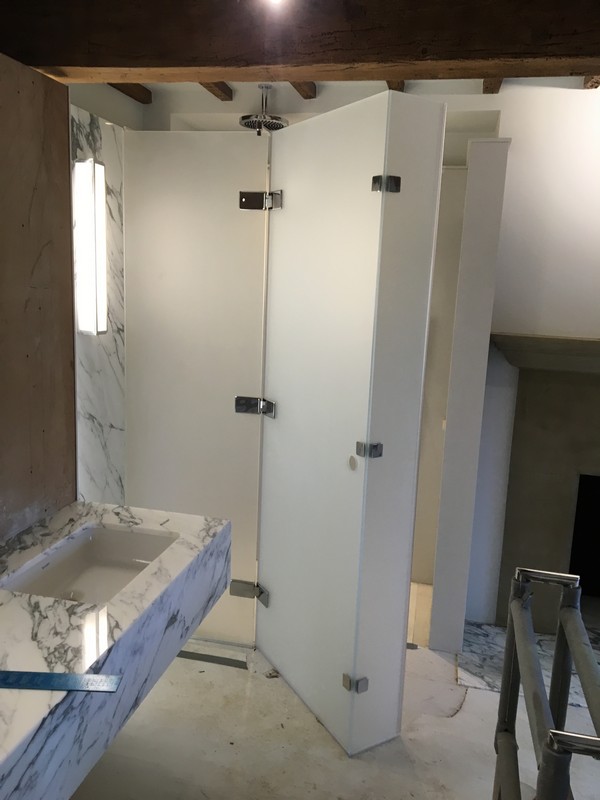 Bespoke frosted glass shower enclosure in Ladbroke Grove luxury bathroom