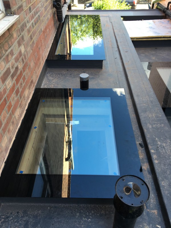 Multiple flat roof skylights on extension in Ladbroke Grove